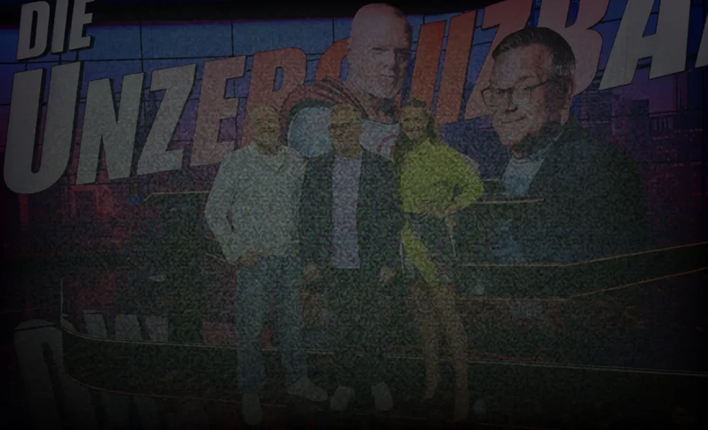Gruppenfoto im Studio der Show „Die Unzerquizbaren“ (abgedunkelt)